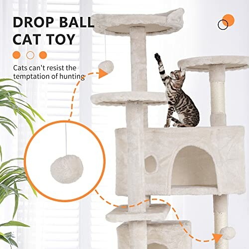 Cat playing on a multi-level cat tree with a dangling ball toy.