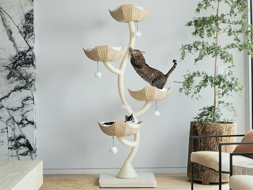 Two cats climbing a modern indoor cat tree with multiple levels.