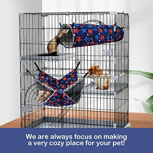 Pet cage with hammocks and animals inside.